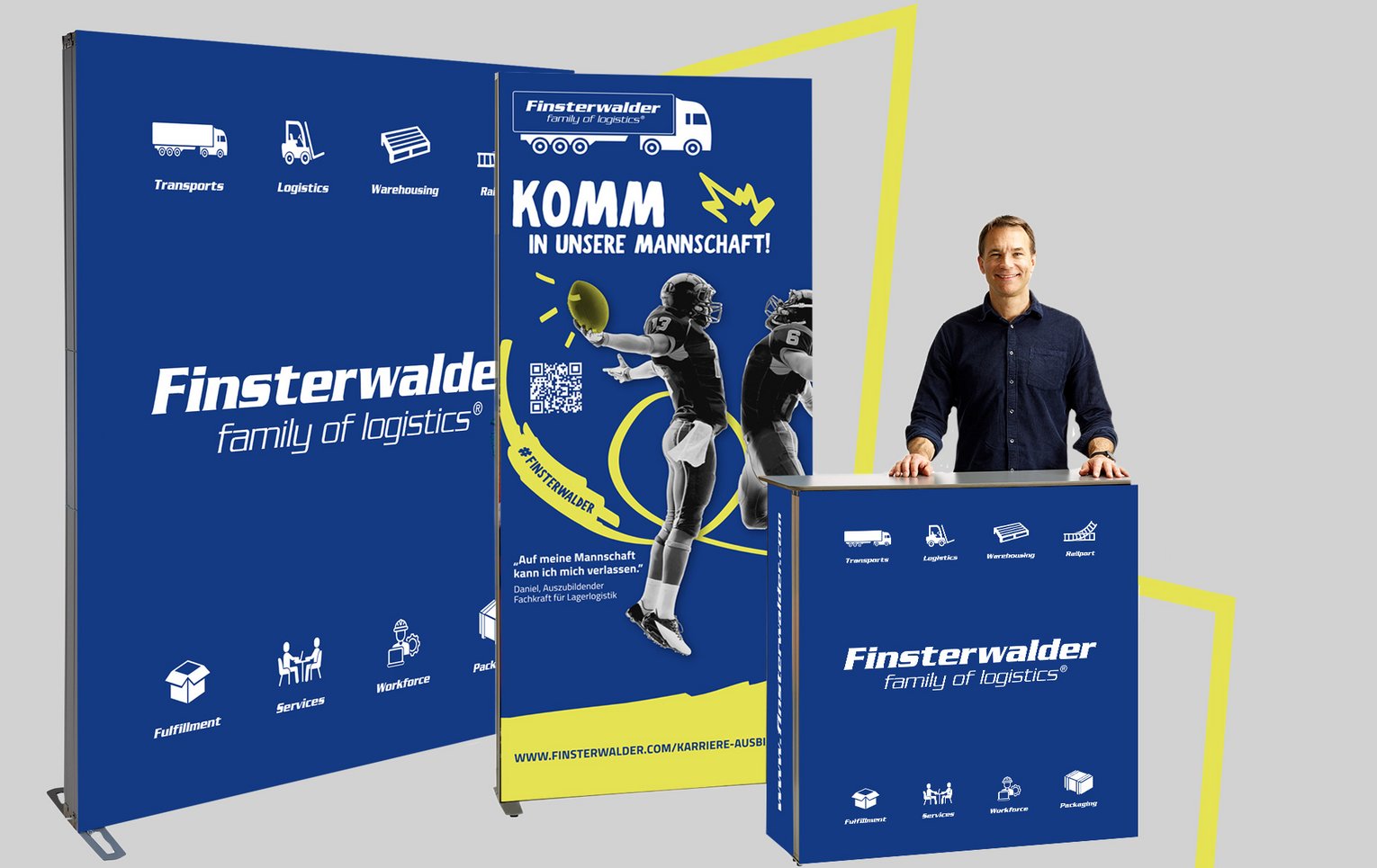 FIWA Messestand FIWA Messestand mit blau-gelbem Design, Sportmotiv und Person hinter einem Counter, Aufschrift.